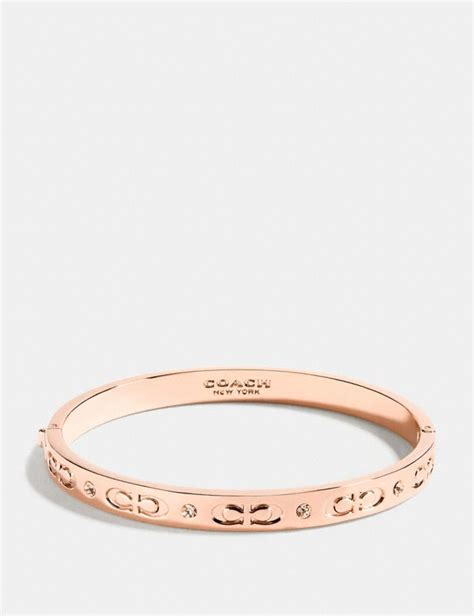 coach kissing c hinged bangle|coach outlet bangle.